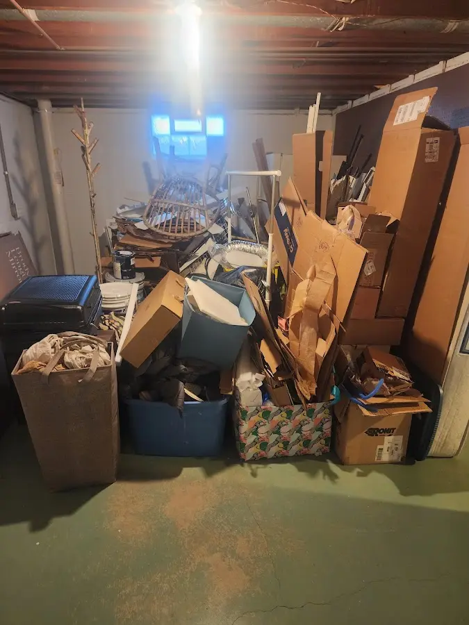 Roll-off dumpster container at job site for Concrete Dumpster Rental in East Lake-Orient Park